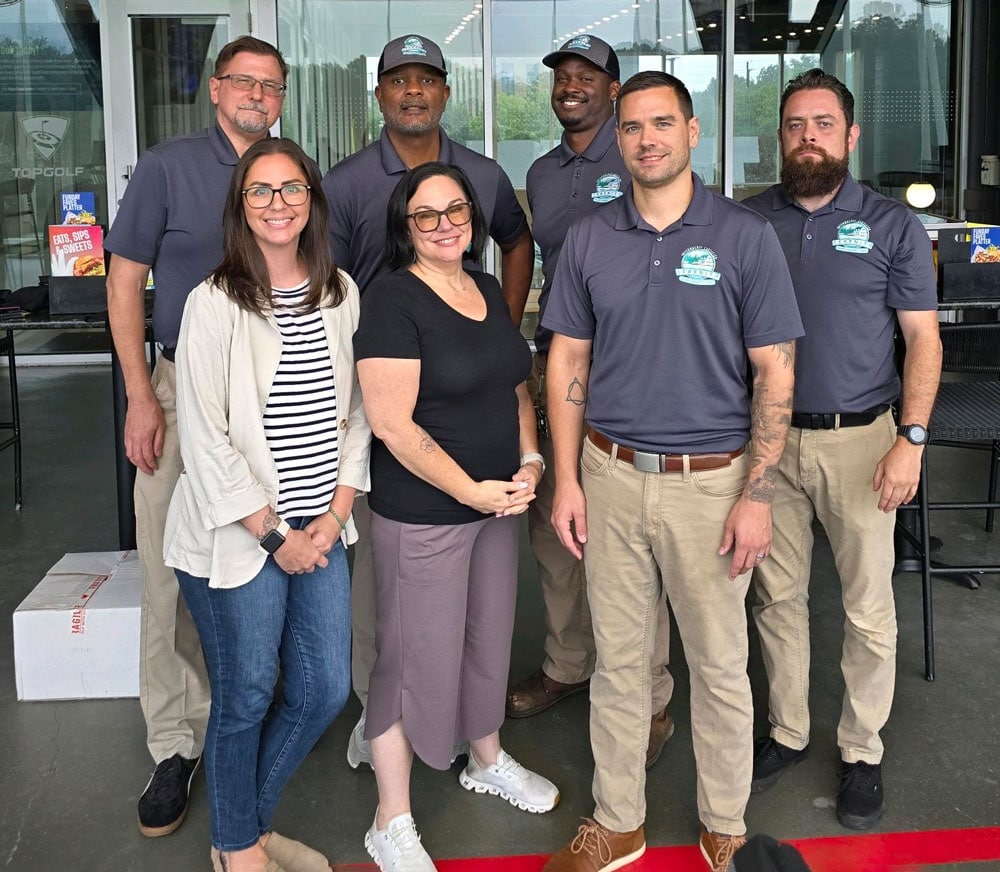 The Serenity Home Inspections team poses together for a group photo representing their professional home inspection services in Atlanta.